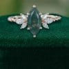 Twist Band Engagement Ring with Marquise-Cut Moss Agate (1)