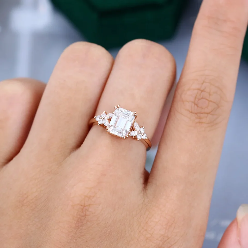 Unique Rose Gold Emerald Cut Moissanite Engagement Ring with Blossom Accents.0