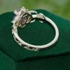 Vintage-Inspired Emerald Cut Purple Sapphire Halo Ring with Intricate Filigree and Milgrain Detailing (5)