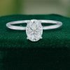 Oval Cut Moissanite Solitaire Ring in White Gold Trellis Setting (3)