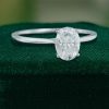 Oval Cut Moissanite Solitaire Ring in White Gold Trellis Setting (4)