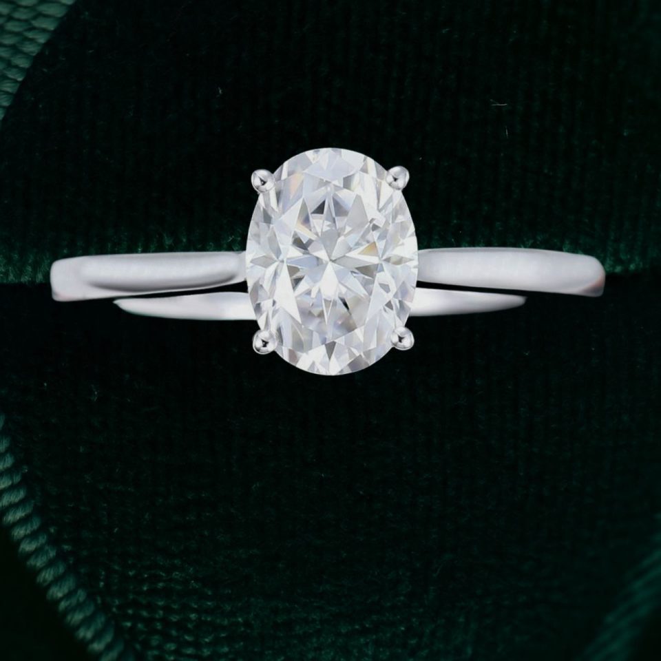 Oval Cut Moissanite Solitaire Ring in White Gold Trellis Setting (5)