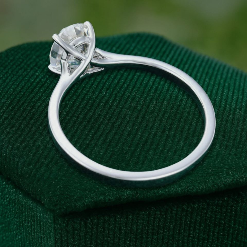 Oval Cut Moissanite Solitaire Ring in White Gold Trellis Setting (6)