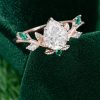 14K Rose Gold Pear Shaped Moissanite Engagement Ring with Emerald Leaf Accents (6)