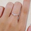Elegant Curved Wedding Band with Pear-Shaped Moissanite (1)