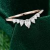 Elegant Curved Wedding Band with Pear-Shaped Moissanite (5)