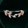 Elegant Marquise Moissanite Curved Wedding Band Featuring Leaf Accents (3)