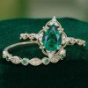 Pear-Cut Emerald Engagement & Wedding Ring Set – Floral Halo Style (3)