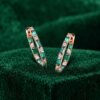 Emerald and Diamond Huggie Earrings with Alternating Baguette and Round Cuts (3)