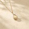 Infinity Pendant Necklace with Round Cut Emerald and Leaf Accents3