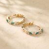 Marquise Emerald and Round Moissanite Huggie Earrings with Elegant Alternating Details (2)