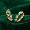Marquise Emerald and Round Moissanite Huggie Earrings with Elegant Alternating Details (4)