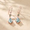 Moss Agate Dangle Earrings with Kite Cut Gemstones and Floral Emeralds (5)