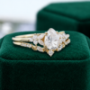 Nature-Inspired Pear Moissanite Engagement Ring Set with Leaf-Carved Band (1)