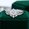 Snowdrift Round Cut Moissanite Cluster Engagement Ring Set Bold Symmetrical Accents (2)